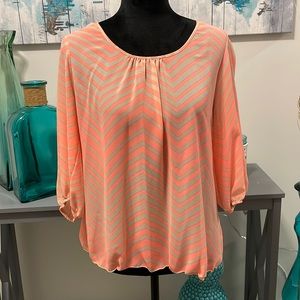 Coral and tan 3/4 sleeved blouse with open back